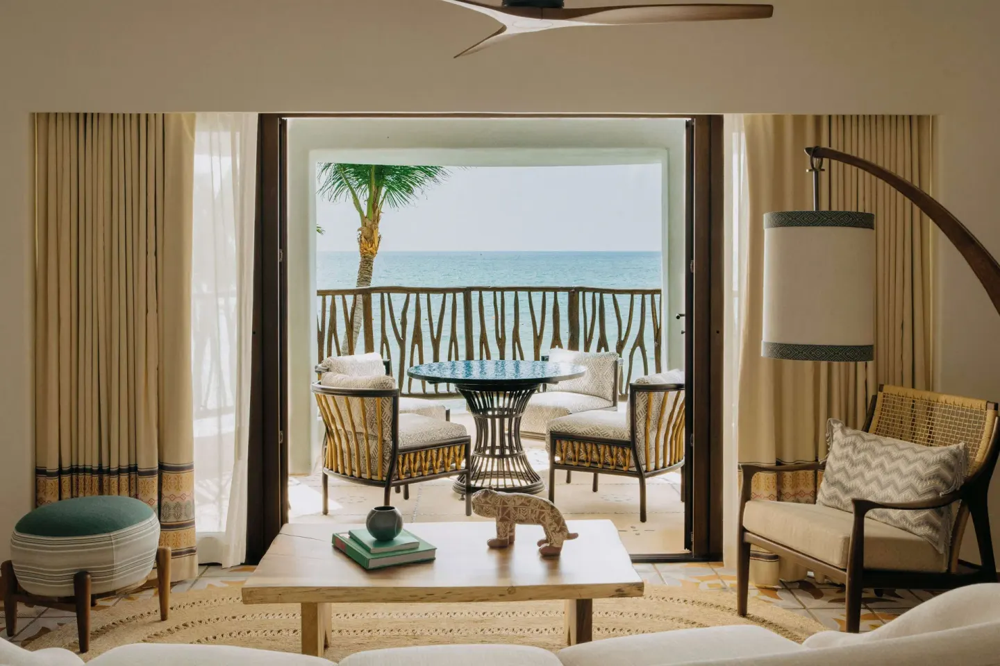 Oceanfront suite living area and balcony seating at Maroma, Riviera Maya.