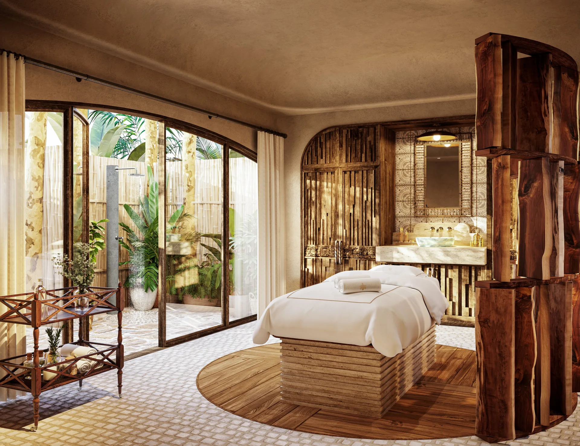 Spa treatment room with massage bed and garden doors at Maroma, Riviera Maya.