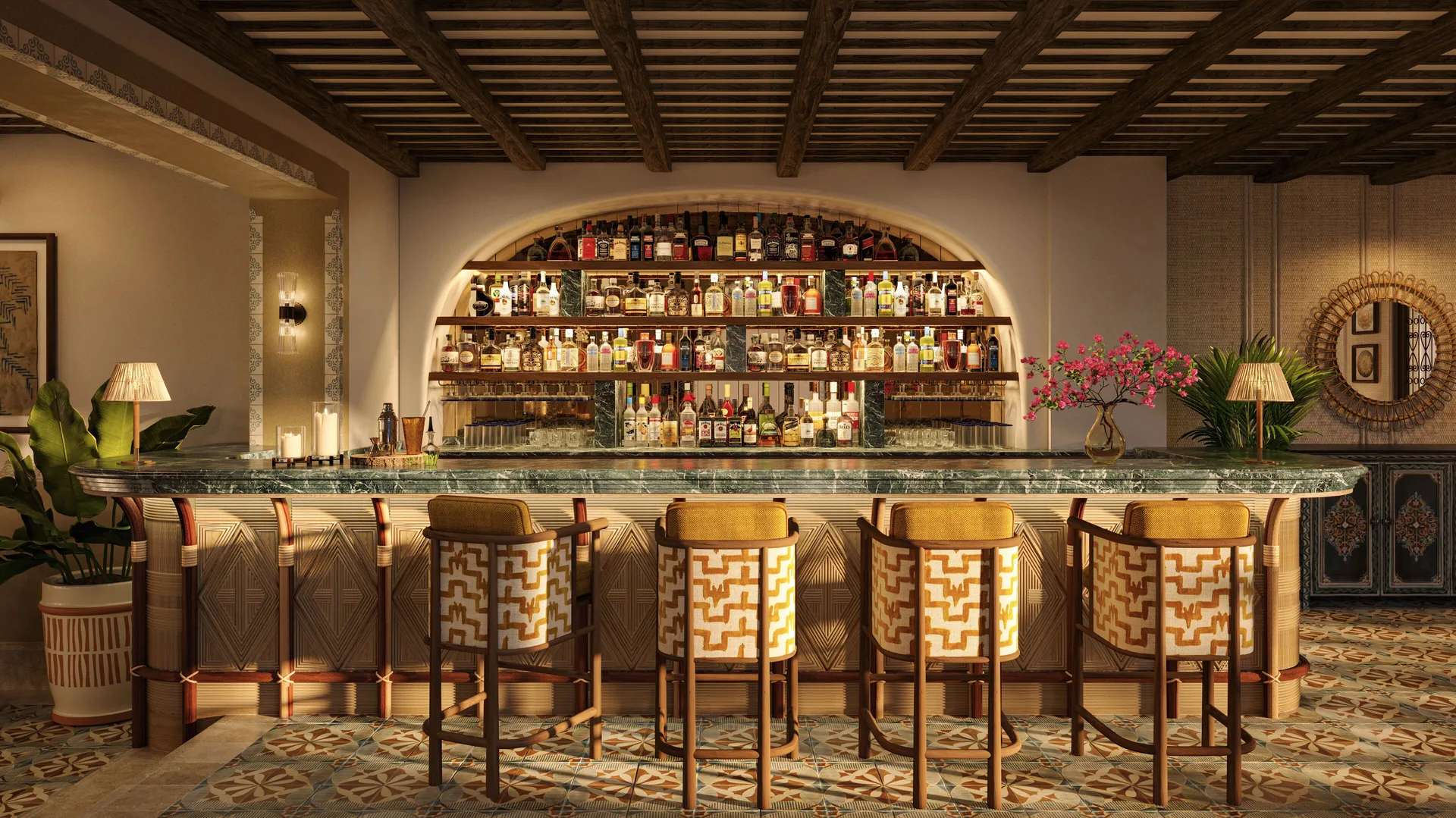Bar with patterned stools and arched bottle shelving at Maroma, Riviera Maya.