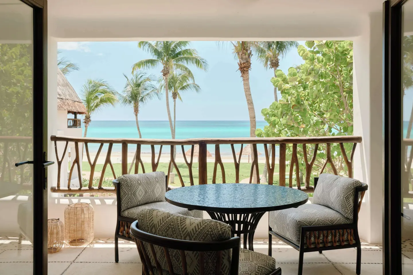 Ocean View Premium Suite balcony with seating and ocean view at Maroma, Riviera Maya.