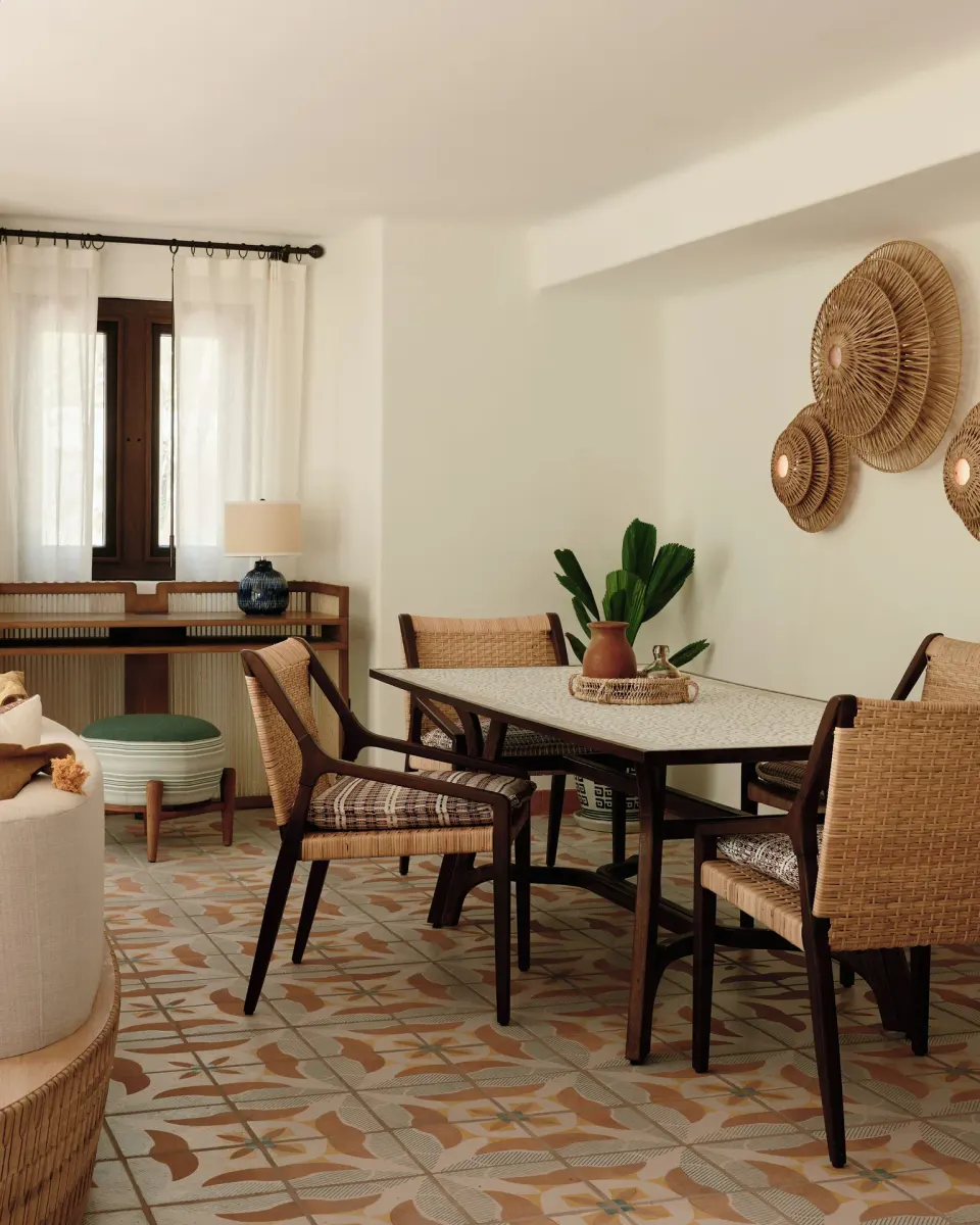 Ocean View Premium Suite dining area with woven chairs at Maroma, Riviera Maya.
