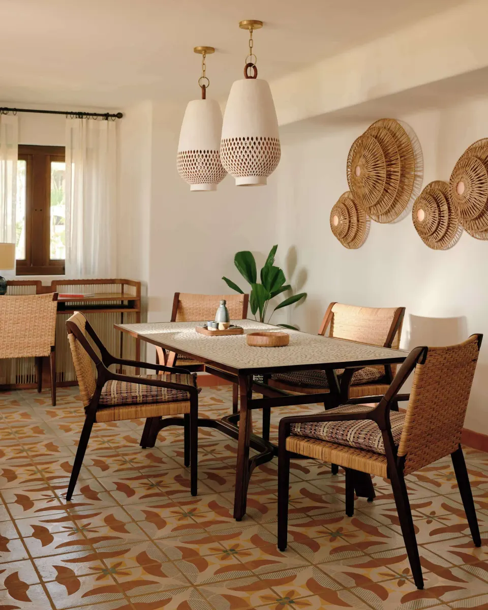 Ocean View Premium Suite dining table with pendant lights at Maroma, Riviera Maya.