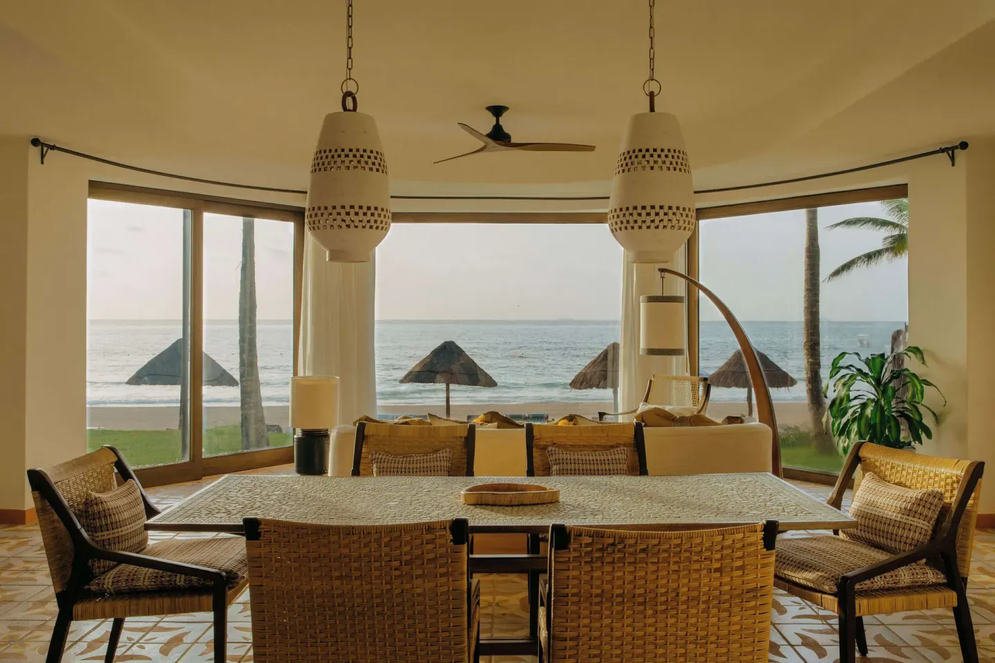 Oceanfront suite dining and lounge area facing the sea at Maroma, Riviera Maya.