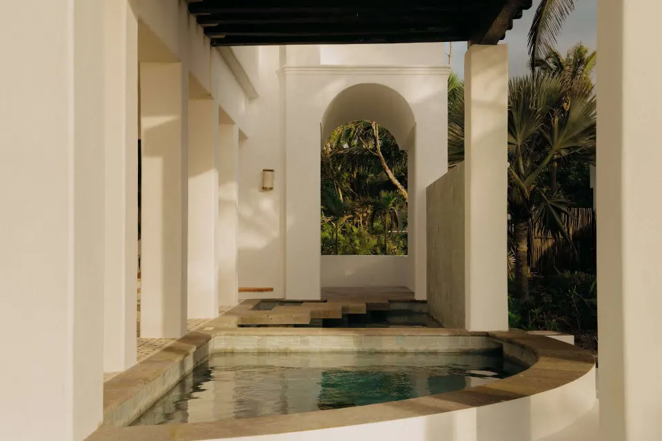 Oceanfront suite plunge pool and white arcade at Maroma, Riviera Maya.