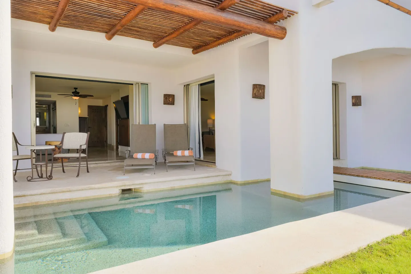 Garden View Casita plunge pool with covered patio and sliding doors at Marquis Los Cabos.