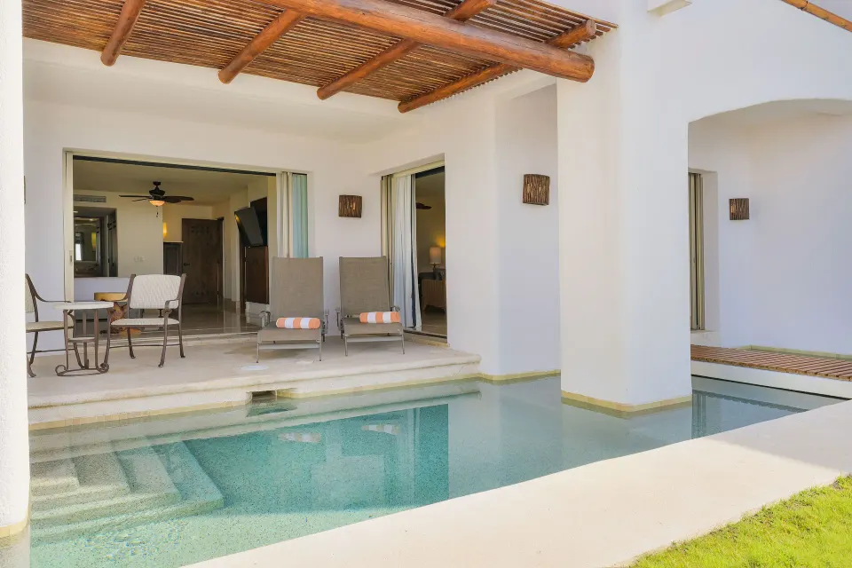 Garden View Casita plunge pool with covered patio and sliding doors at Marquis Los Cabos.