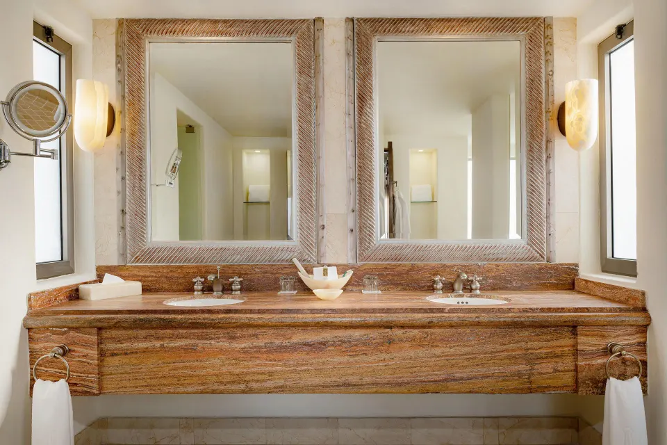 Garden View Casita double vanity with framed mirrors at Marquis Los Cabos.