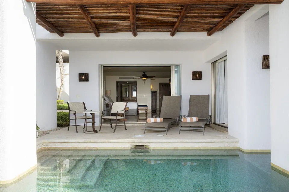 Garden View Casita patio with loungers and plunge pool at Marquis Los Cabos.