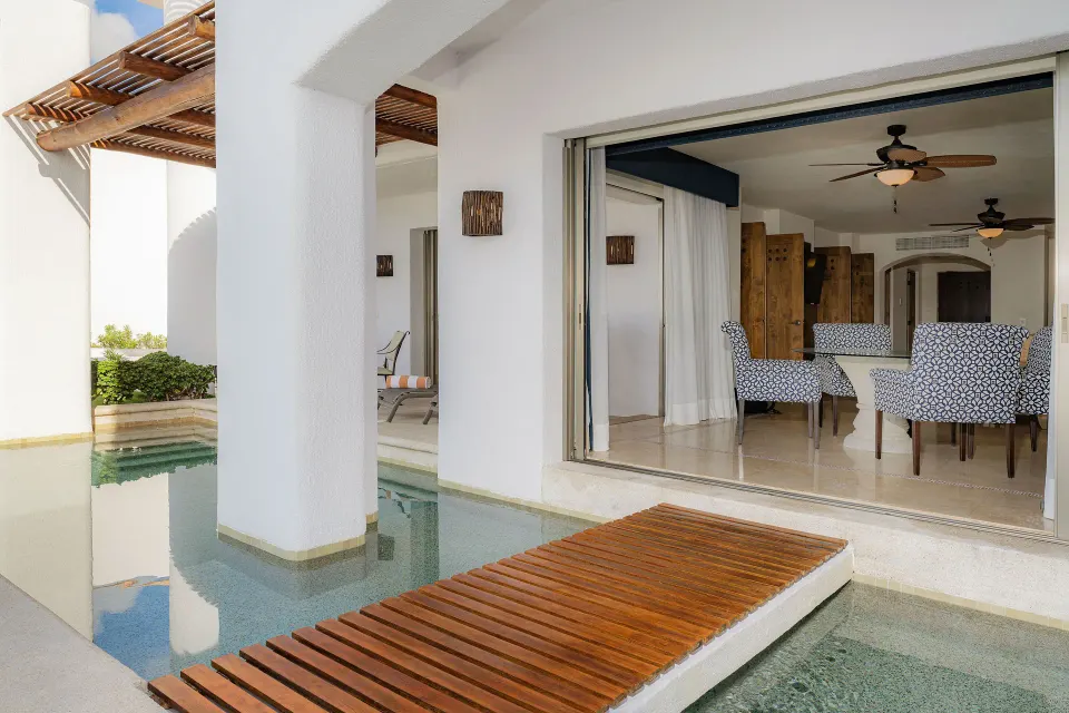 Garden View Casita plunge pool terrace and indoor sitting area at Marquis Los Cabos.