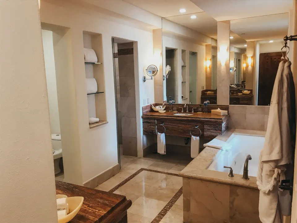 Master Suite bathroom with soaking tub and vanity at Marquis Los Cabos.