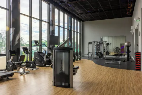 Fitness center with cardio machines and weight equipment at Marriott Cancun.