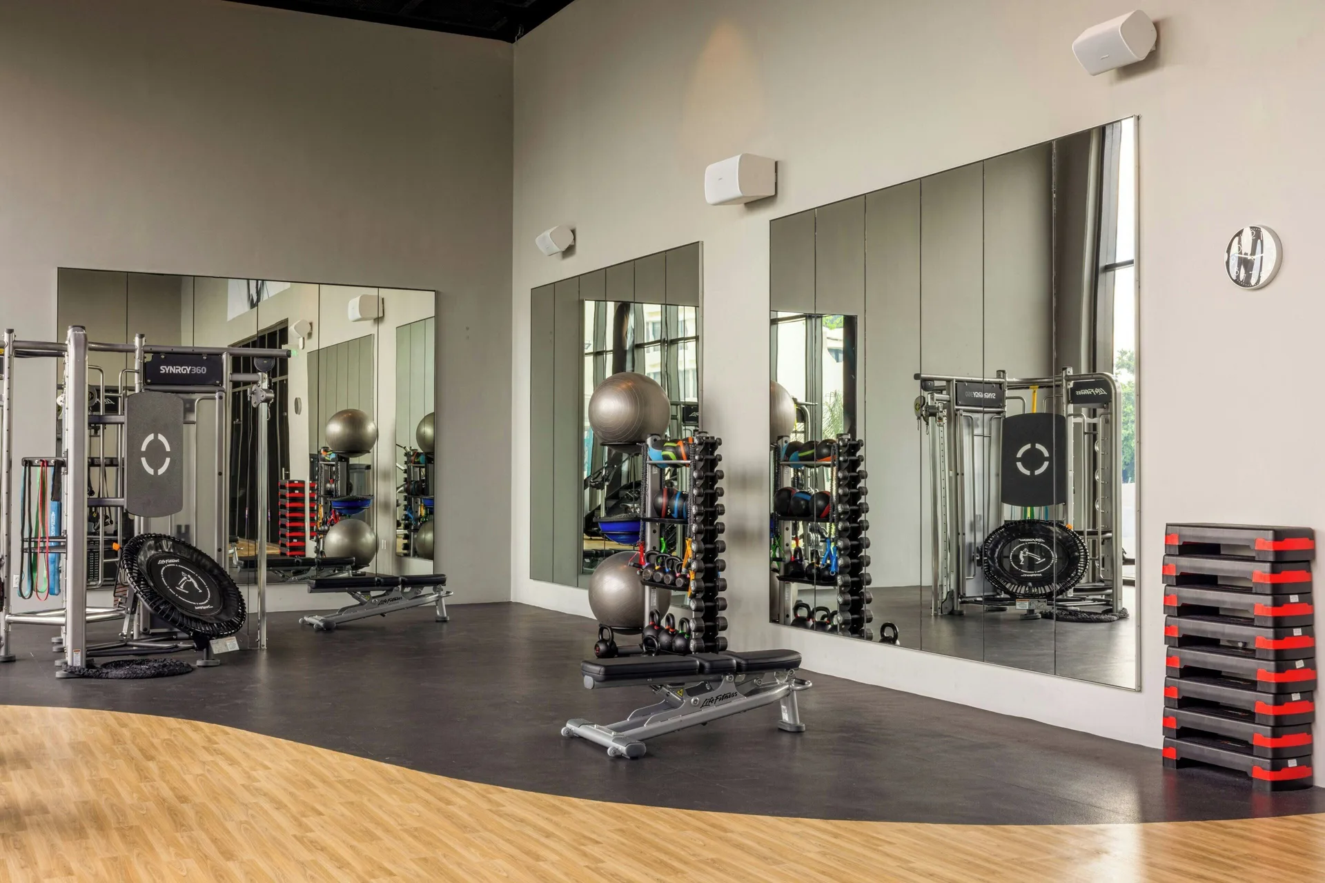 Fitness studio with mirrors, weights and resistance equipment at Marriott Cancun.