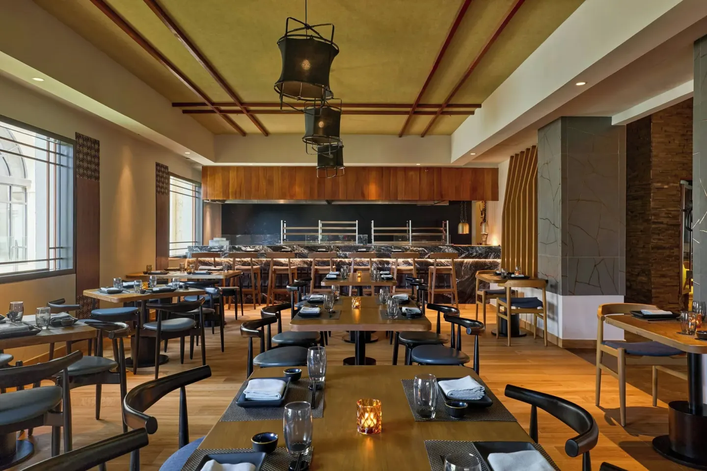 Japanese dining room with set tables and an open cooking counter at Marriott Cancun.