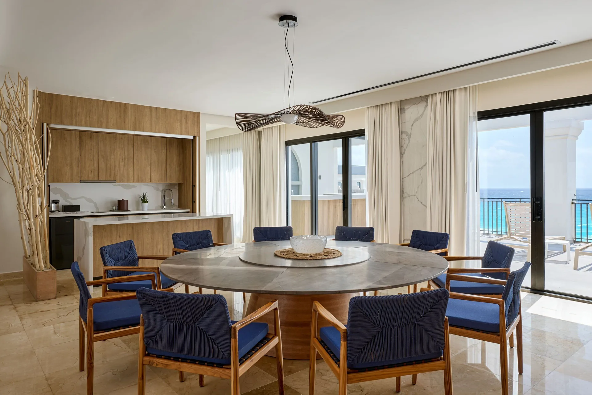 Presidential Suite dining area with kitchenette and balcony view at Marriott Cancun.