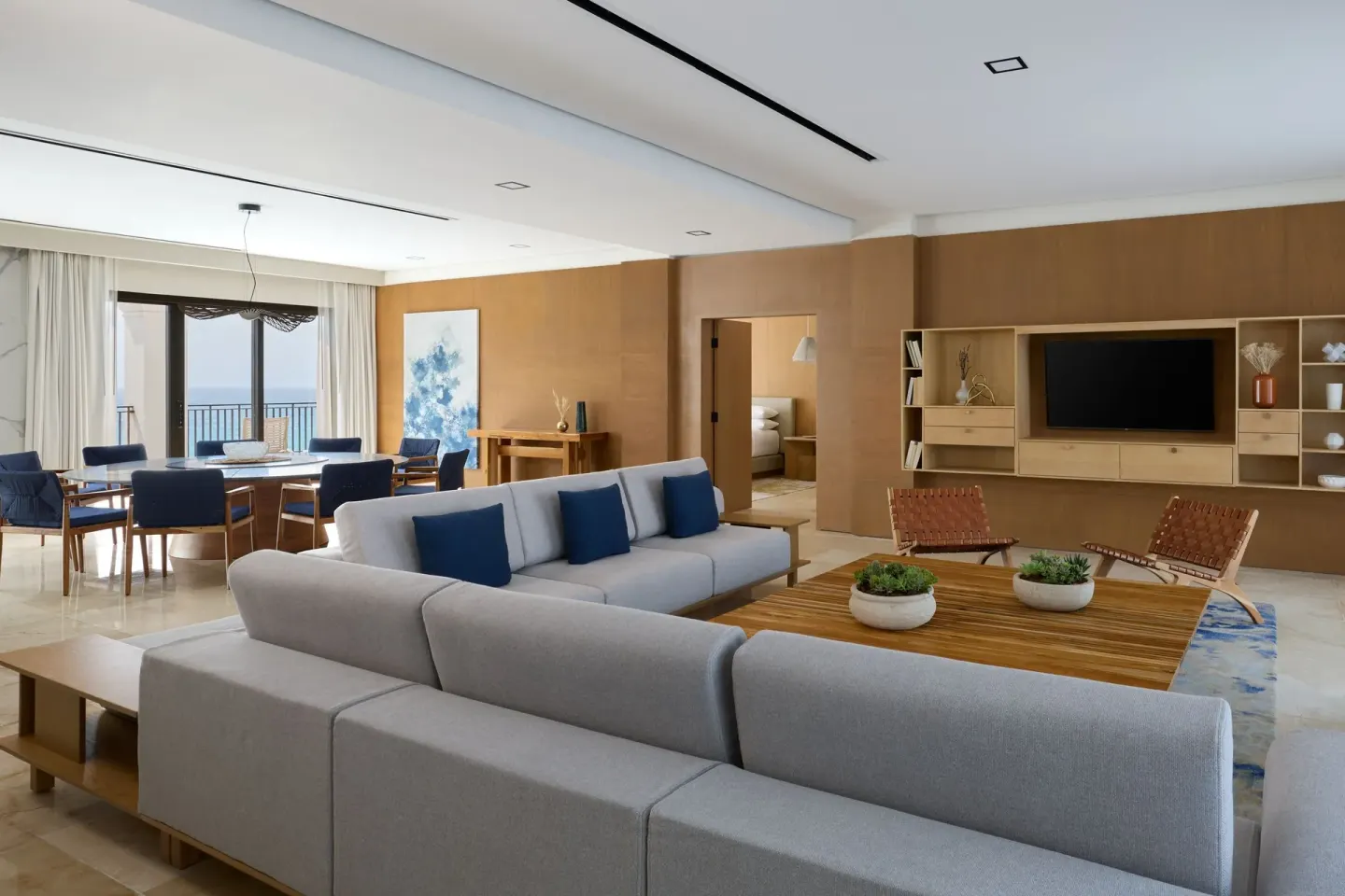 Presidential Suite living room, dining area, and bedroom doorway at Marriott Cancun.