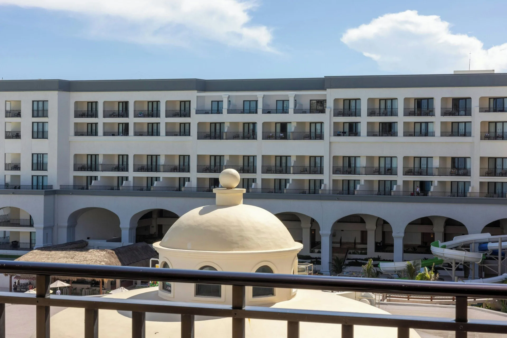 Balcony resort view of guest room buildings at Marriott Cancun.