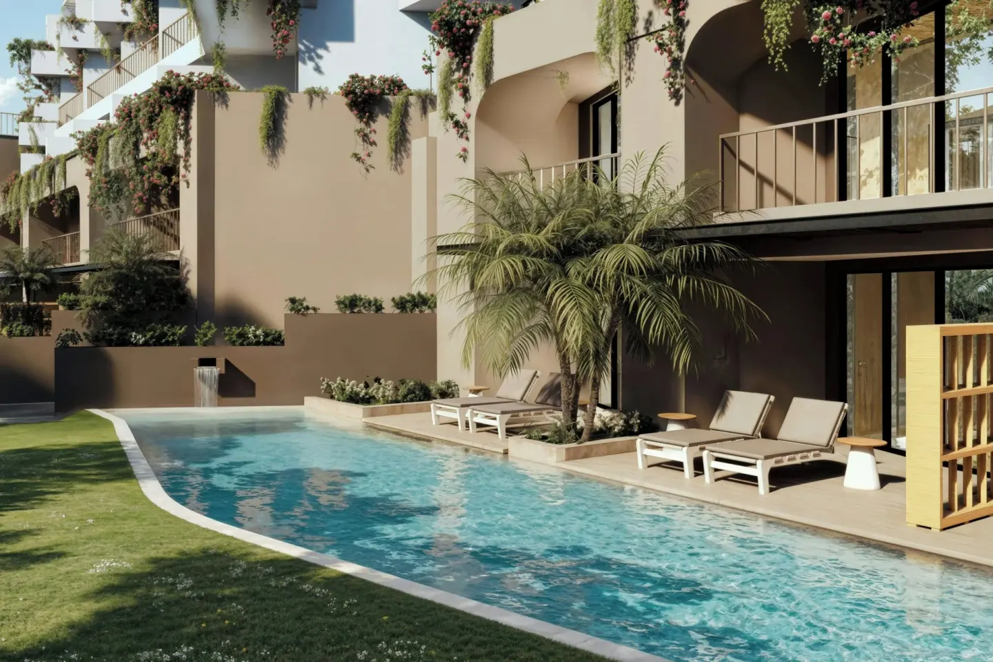 Curved pool with loungers, palms, and balcony terraces at Marriott Puerto Vallarta Resort & Spa.