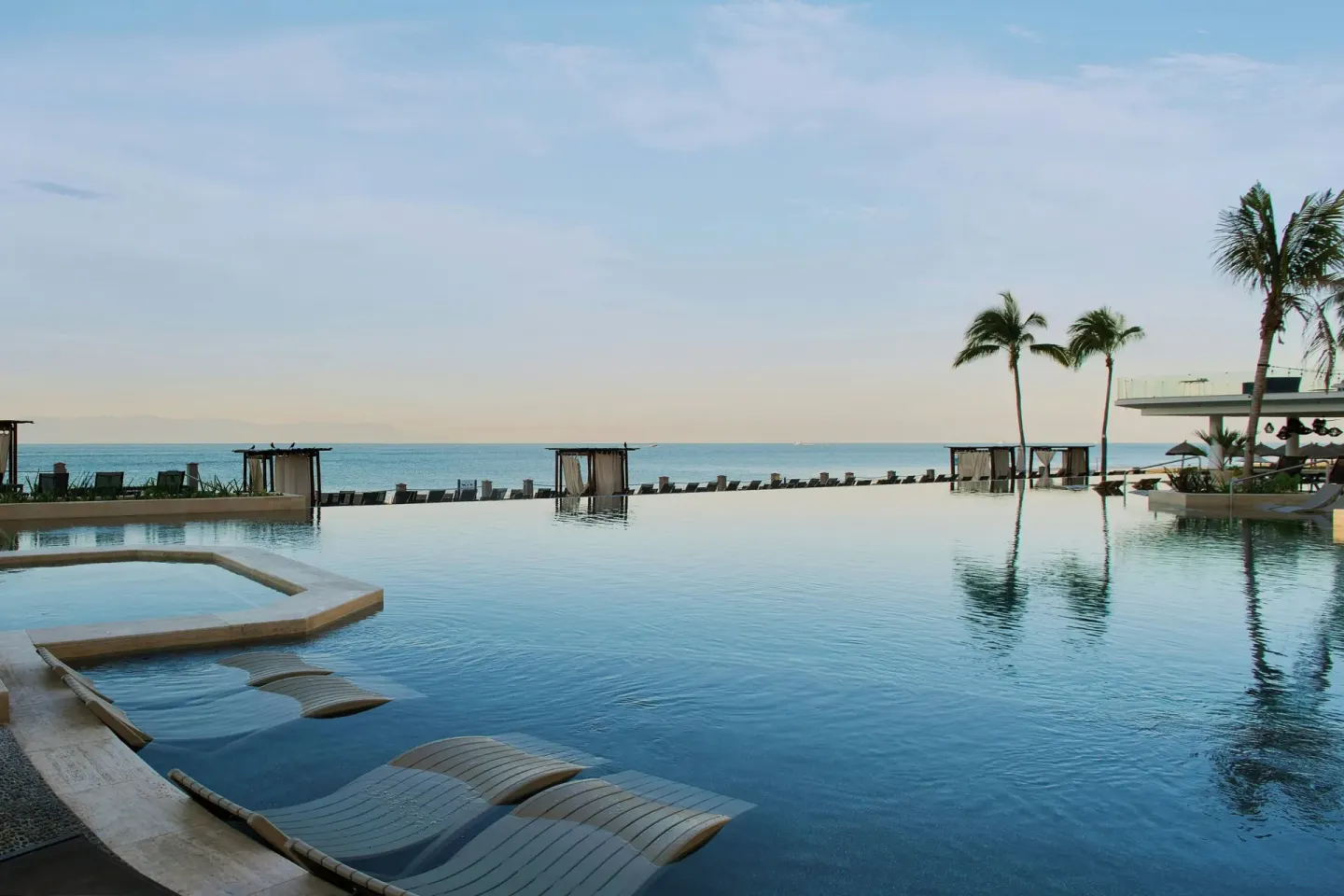 Infinity pool with ocean view at Marriott Puerto Vallarta Resort & Spa.