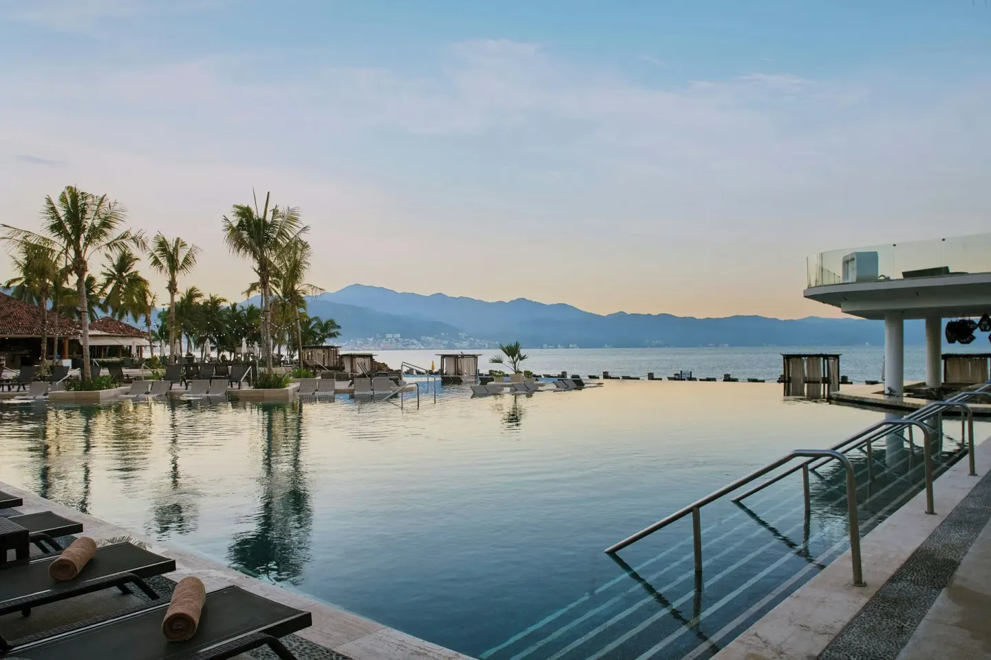 Infinity pool with bay and mountain views at Marriott Puerto Vallarta Resort & Spa.