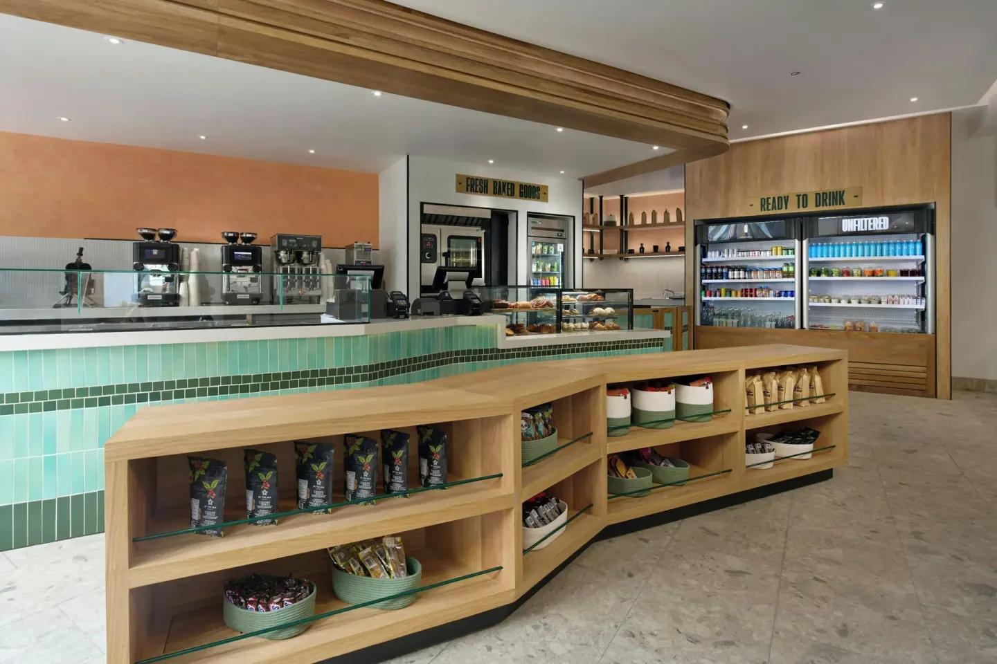 Coffee counter and grab-and-go shelves at Unfiltered at Marriott Puerto Vallarta Resort & Spa.