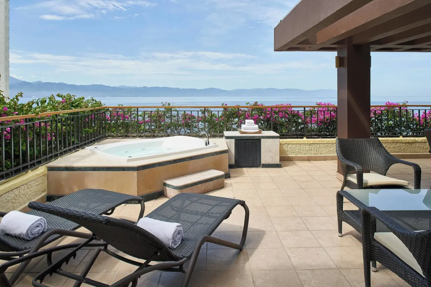 Luxury Suite terrace with hot tub and ocean view at Marriott Puerto Vallarta Resort & Spa.
