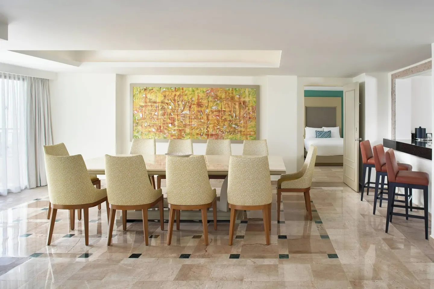 Presidential Suite dining area and bedroom doorway at Marriott Puerto Vallarta Resort & Spa.