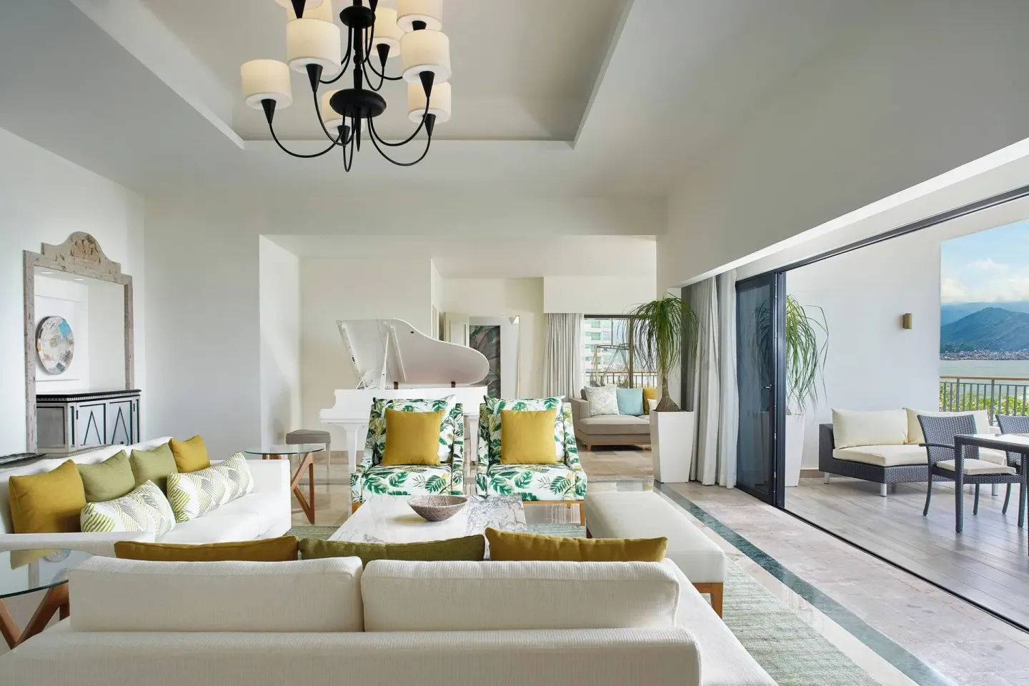 Presidential suite living room and oceanfront terrace at Marriott Puerto Vallarta Resort & Spa.