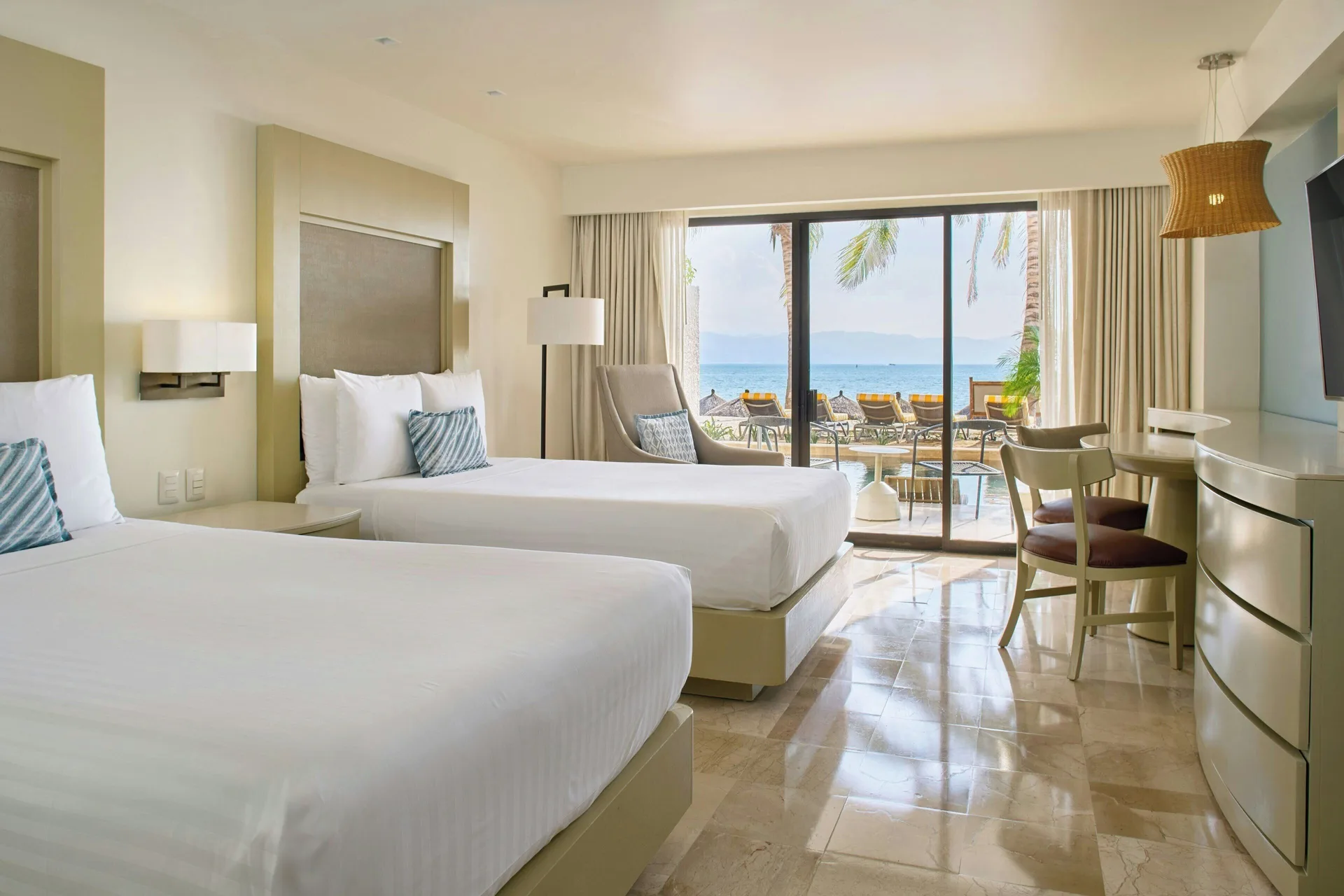 Room Two Beds Oceanfront at Marriott Puerto Vallarta with two double beds and direct views of the Pacific Ocean.
