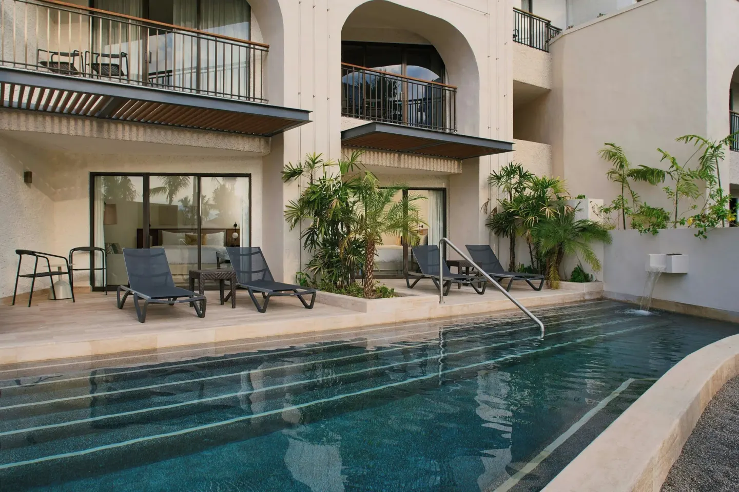 Swim-up terrace outside a room at Marriott Puerto Vallarta Resort & Spa.