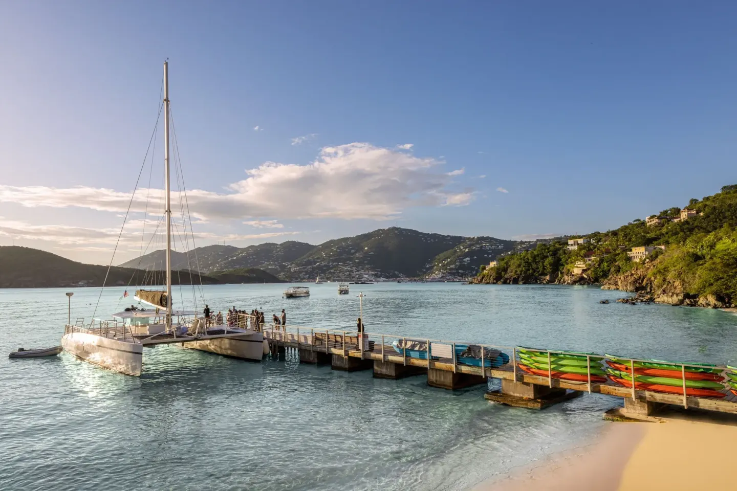 Beach pier with a catamaran and kayaks at Marriott's Frenchman's Cove.