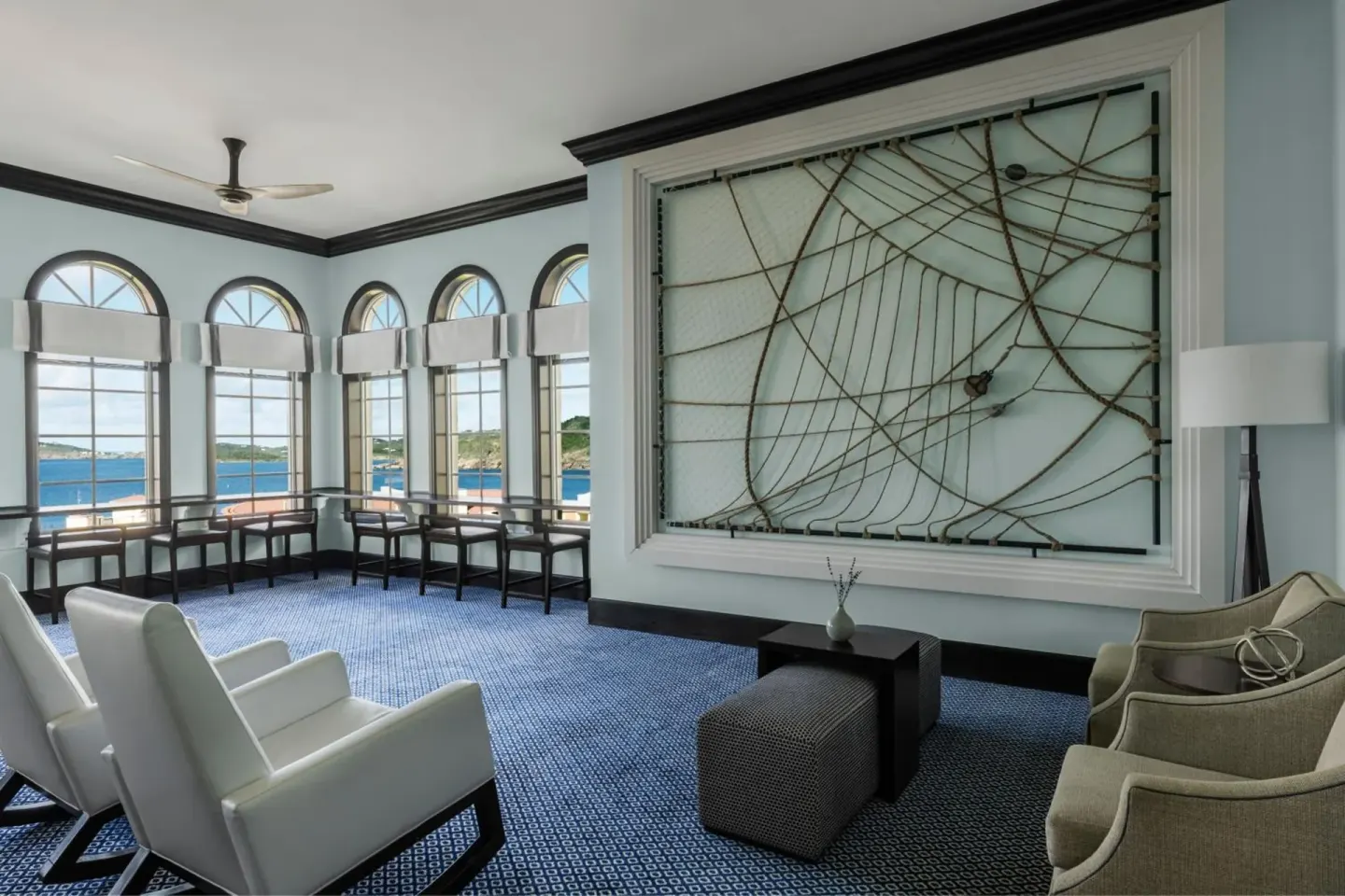 Lounge seating with arched windows at Marriott's Frenchman's Cove.
