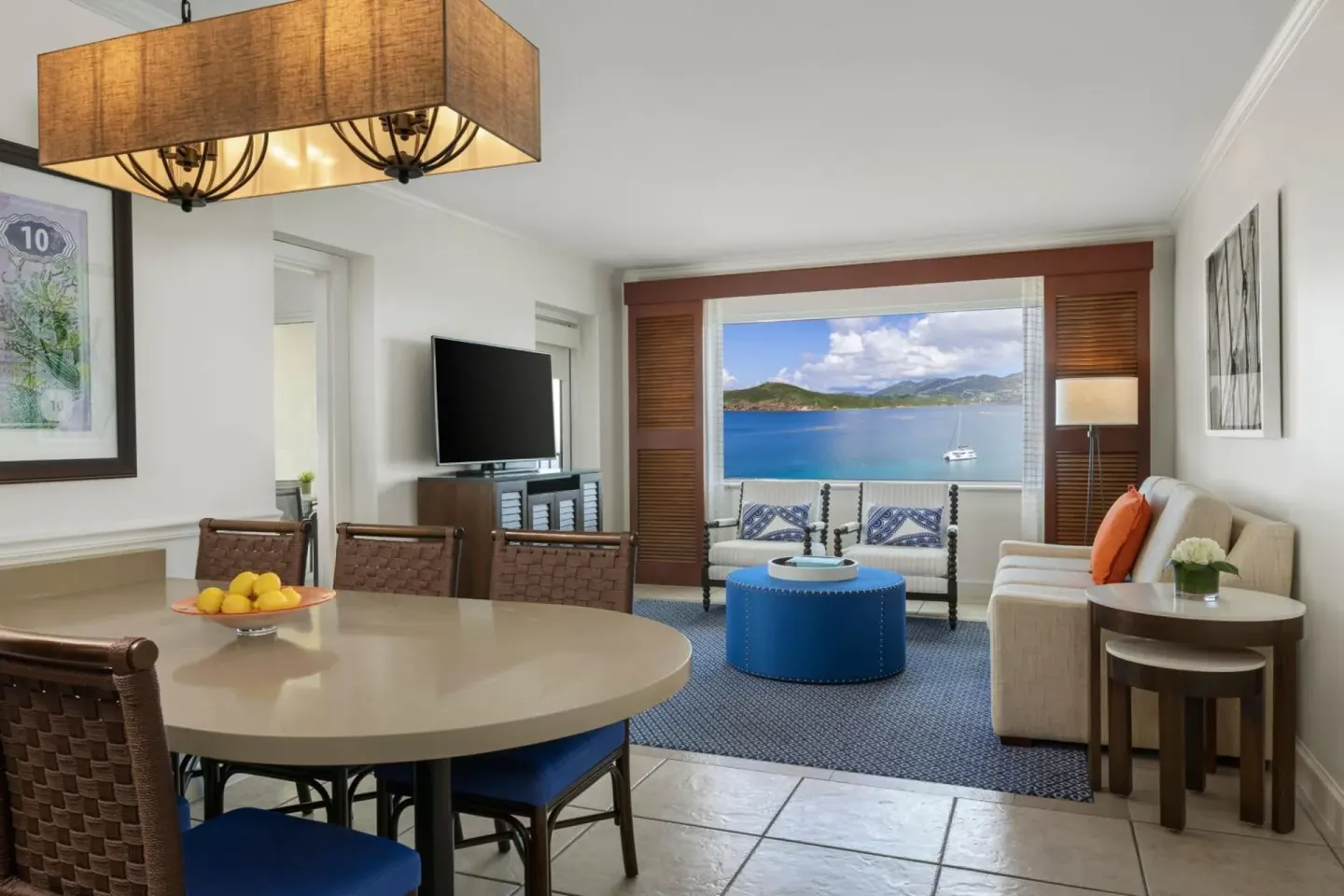 Living and dining area with bay view at Marriott's Frenchman's Cove.