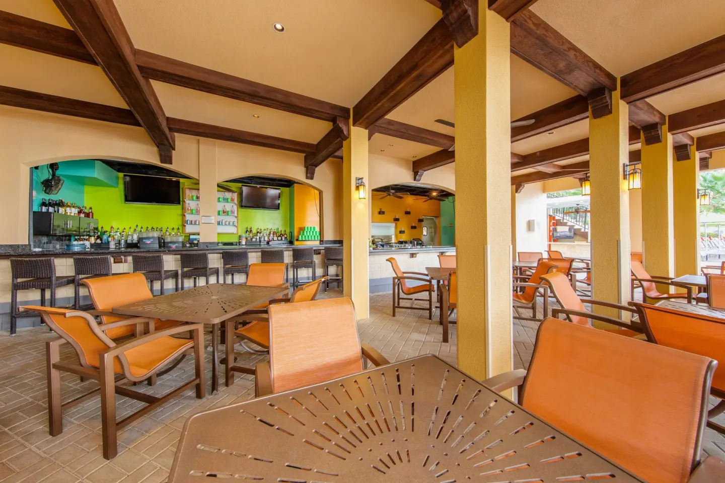 Open-air bar and patio seating at Marriott's Frenchman's Cove.