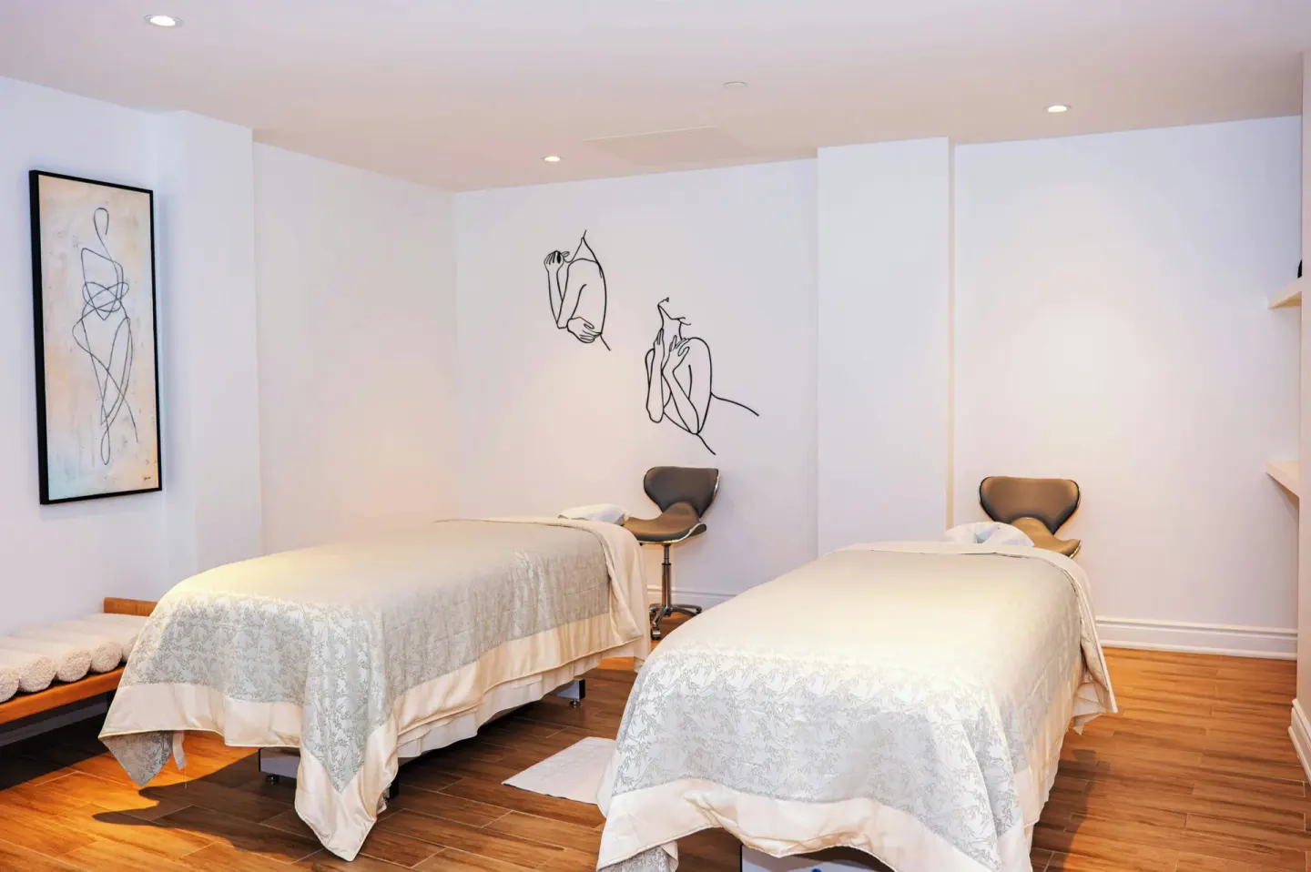 Two spa treatment beds in a softly lit room at Marriott's St. Kitts Beach Club.