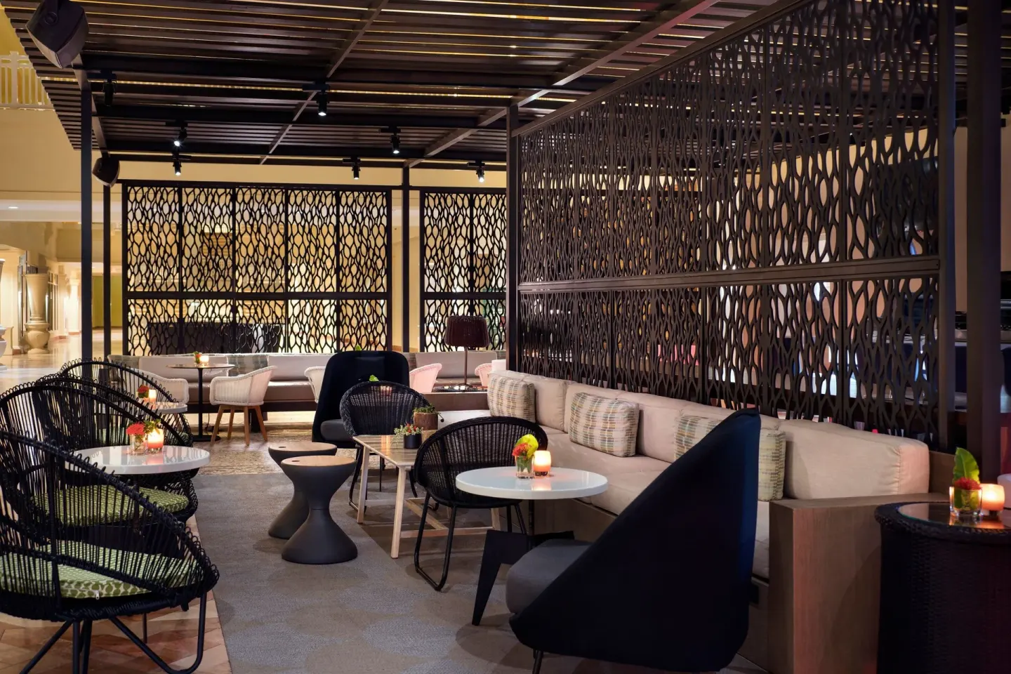 Lounge seating with patterned screens at Marriott's St. Kitts Beach Club.