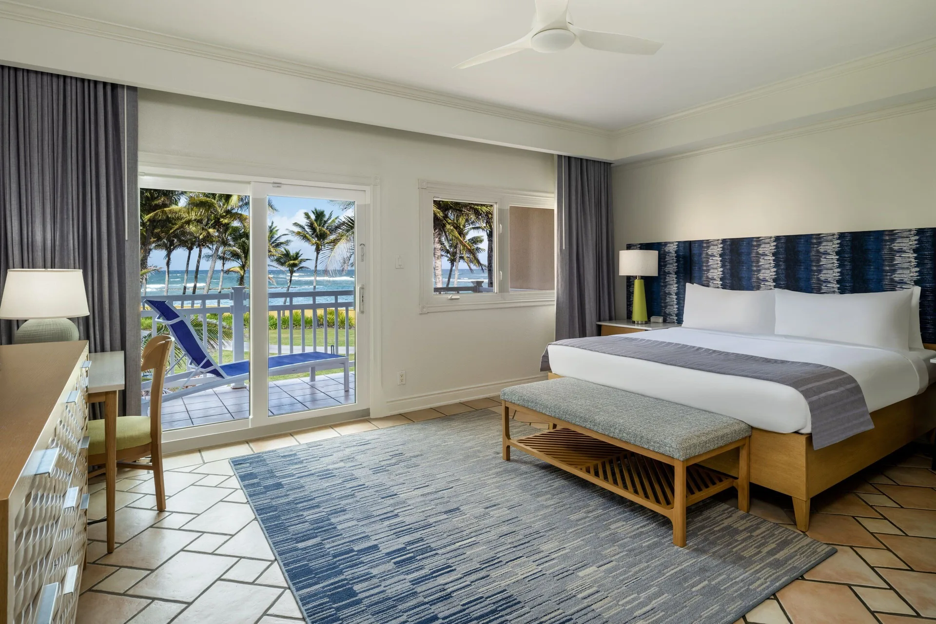 Primary bedroom with king bed and ocean-view balcony at Marriott's St. Kitts Beach Club.