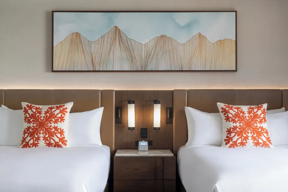 Two-bed Deluxe Golf View Tower room headboards at Mauna Kea Beach Hotel.