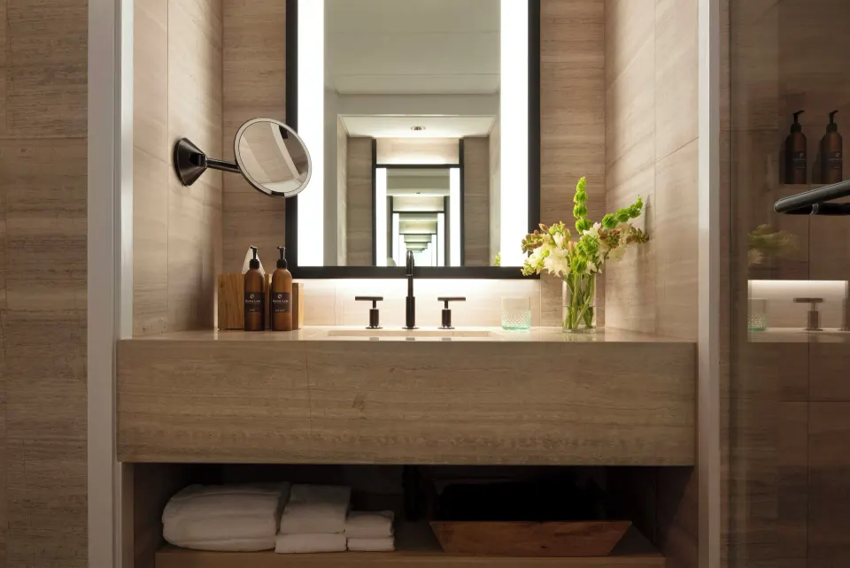 Room Mountain View bathroom vanity with illuminated mirror at Mauna Lani.