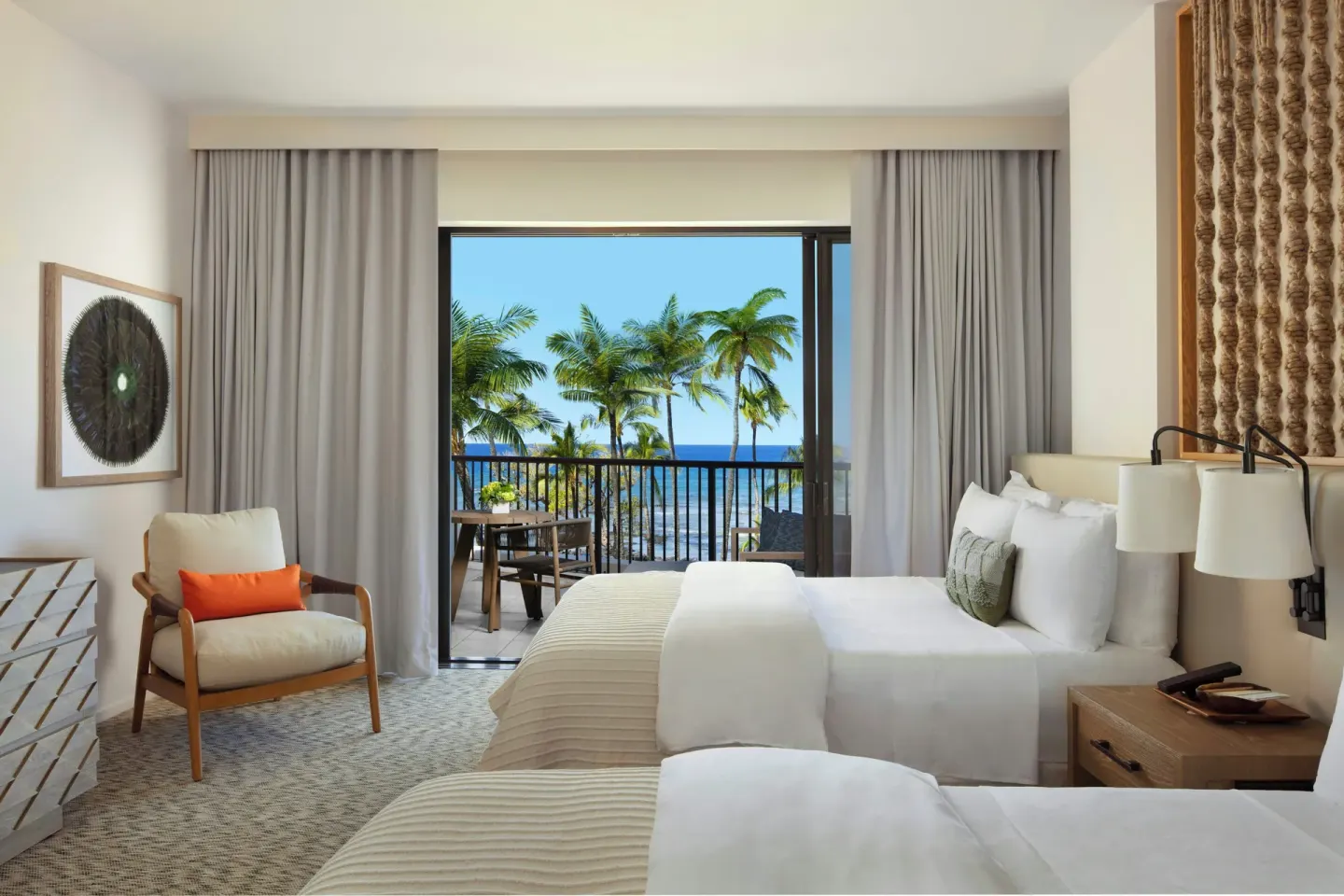 Oceanfront mobility and hearing guest room with two beds and balcony view at Mauna Lani.
