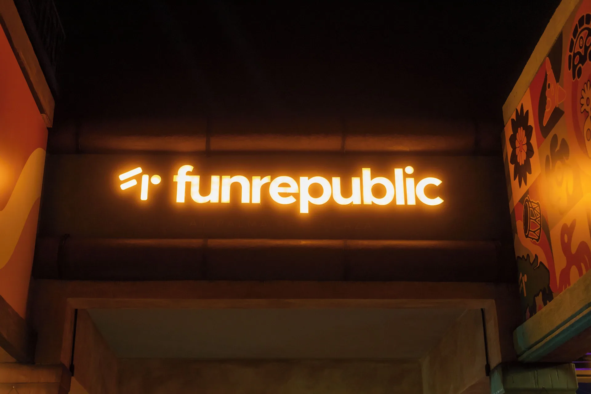 Glowing funrepublic entrance sign at Melia Caribe Beach Resort.