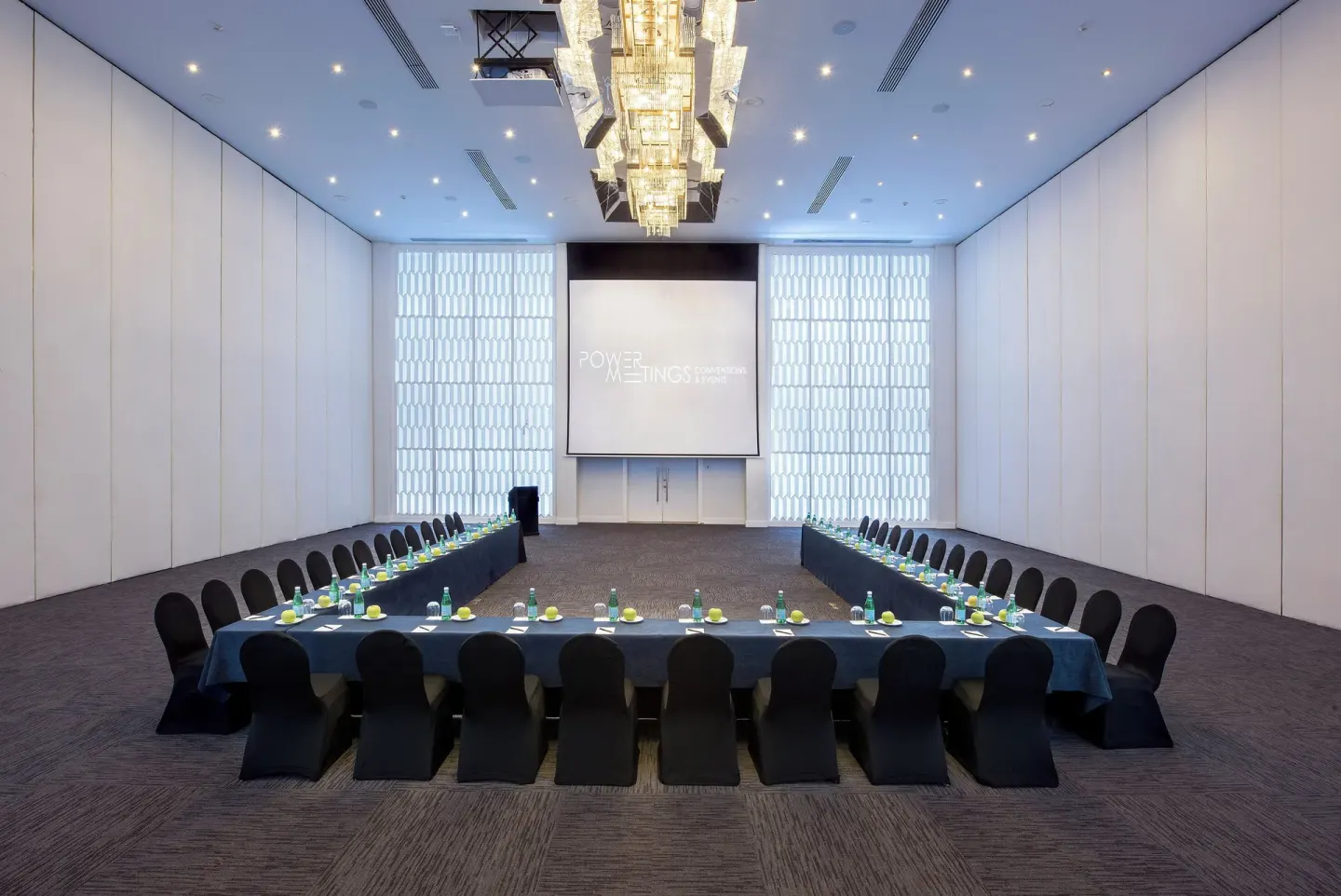 U-shaped meeting setup in a conference hall at Melia Caribe Beach Resort.
