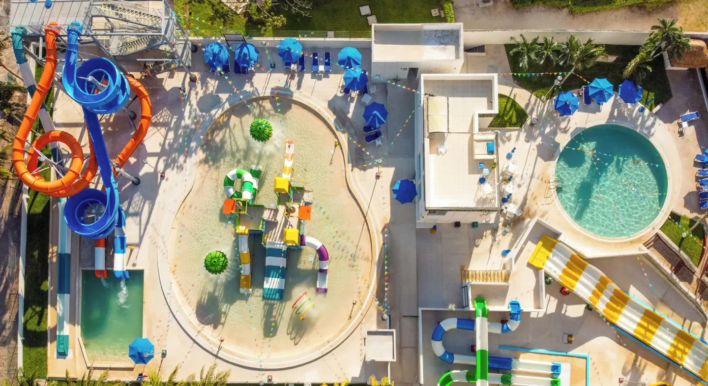Aerial view of the water park slides and splash areas at Melia Casa Maya Cancun.