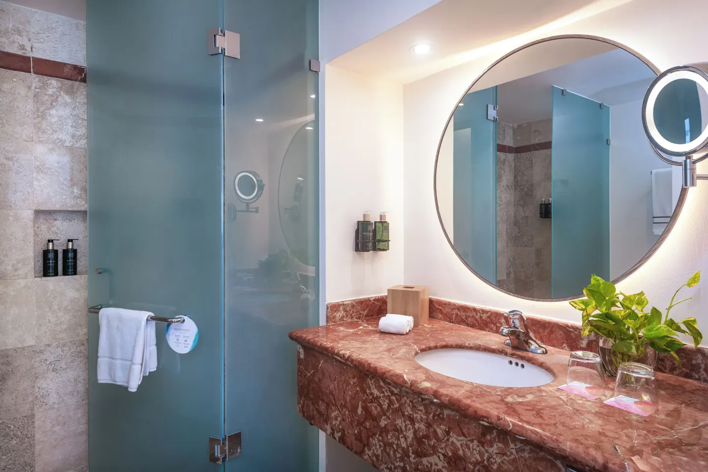 Melia Casa Maya Cancun bathroom vanity and shower at Melia Casa Maya Cancun.