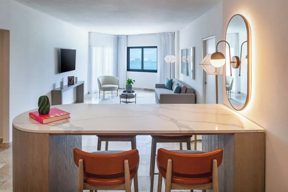 The Level Ocean View Suite counter and living area with ocean view at Melia Casa Maya Cancun.