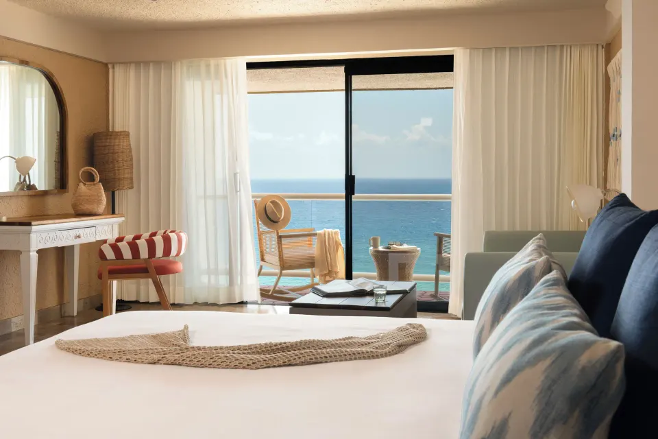 Premium Room king bed with balcony and ocean view at Melia Cozumel