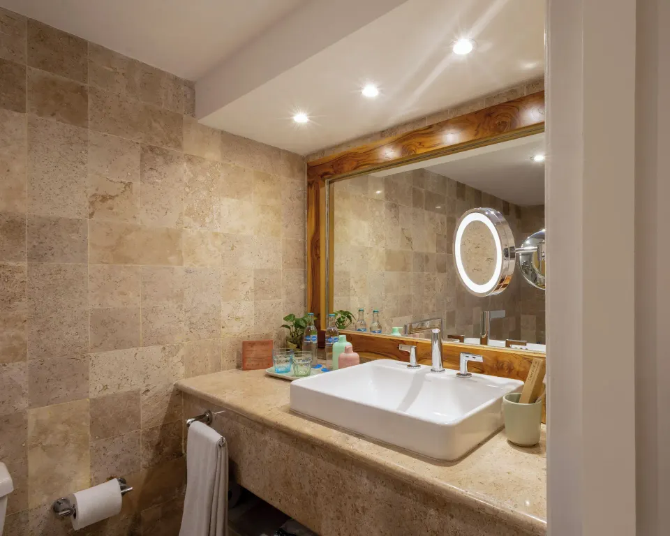 ZEL Room Ocean View bathroom sink and vanity mirror at Melia Cozumel