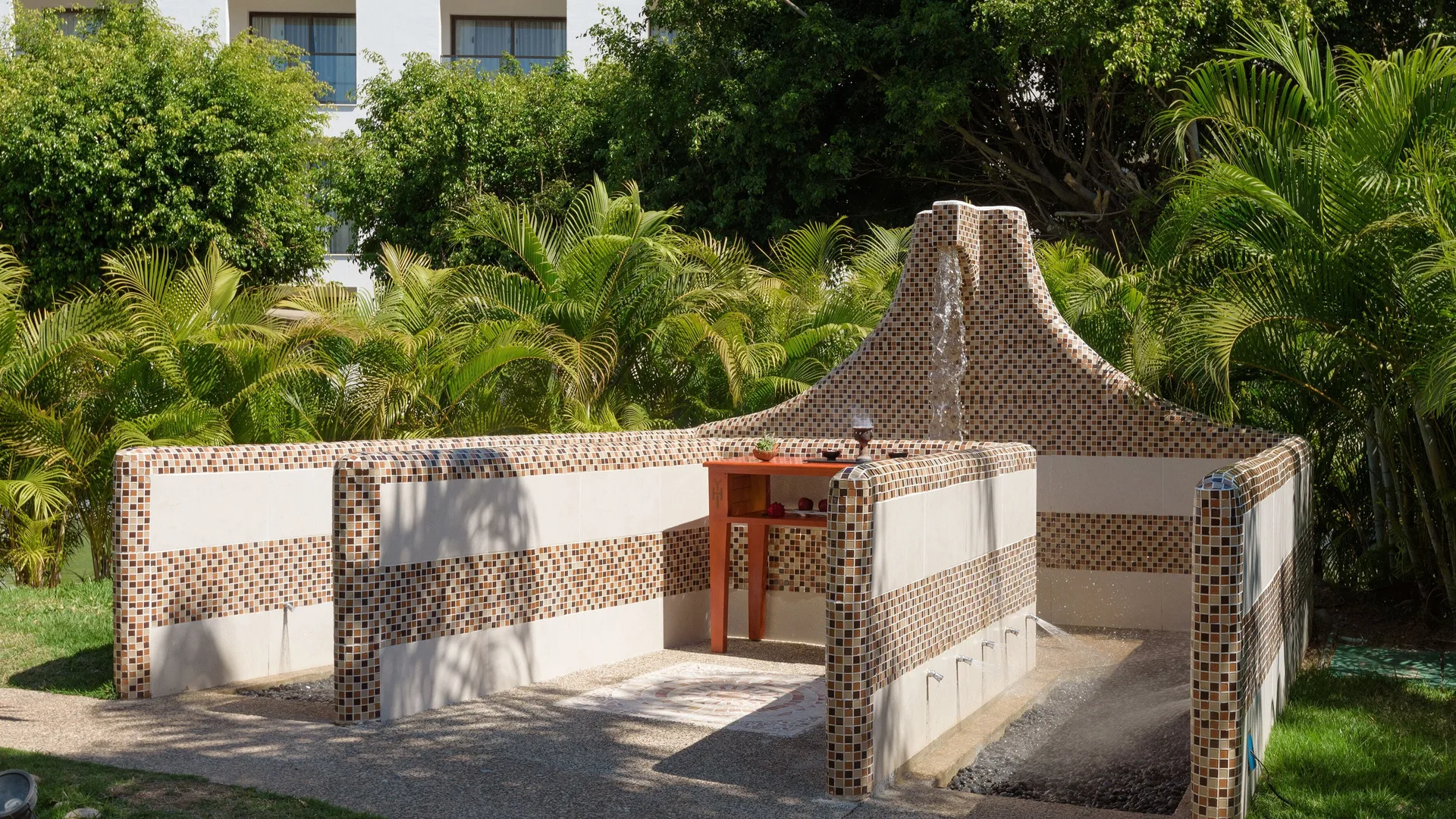 Tiled outdoor hydrotherapy area in the gardens at Melia Puerto Vallarta.
