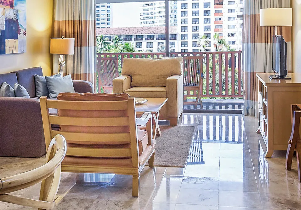 Premium Suite Garden View sitting area with balcony at Melia Puerto Vallarta.