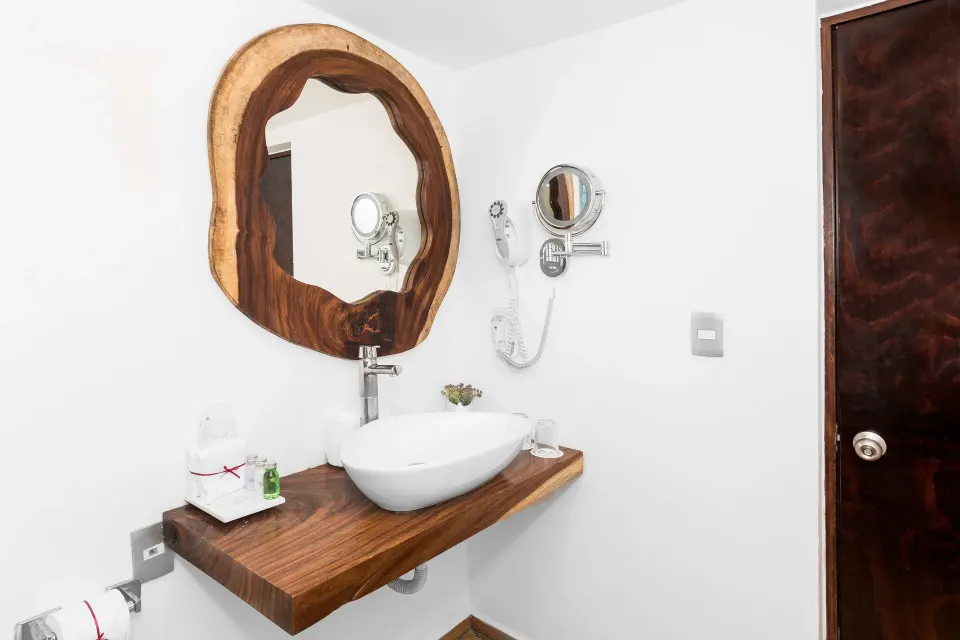 Deluxe Villa suite bathroom vanity with vessel sink at Mia Reef Isla Mujeres.