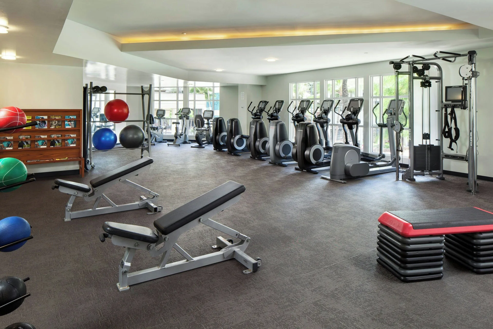 Fitness center with cardio machines and weights at Moana Surfrider, A Westin Resort & Spa.